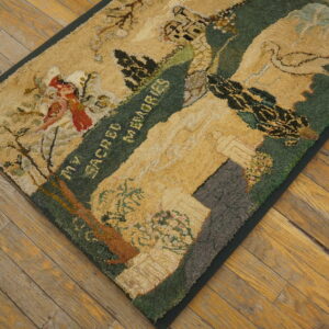 Beige and green pictorial rug featuring a bird, text, and architecture, resting on rustic hardwood planks.