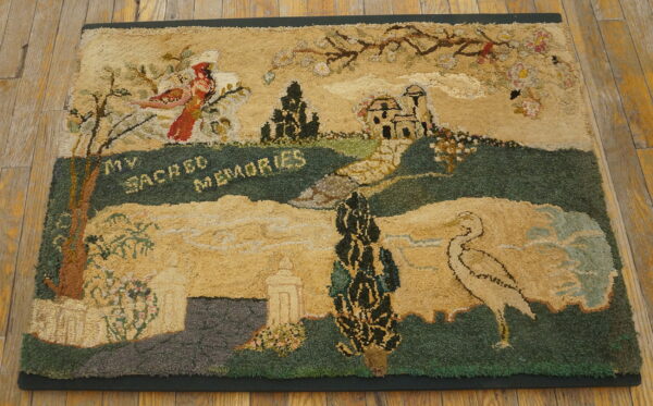 High-pile rug with an earthy landscape design, featuring green hills, birds, and the words "my sacred memories" on wood floor.