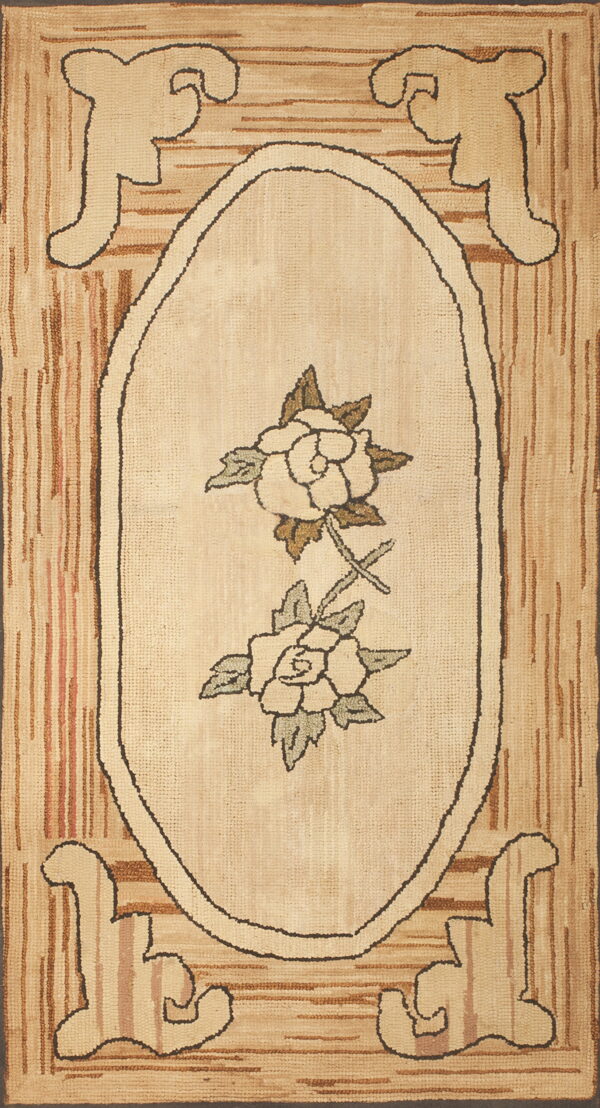 Textured cream rug featuring two roses in an oval medallion border on a striped tan and brown background.