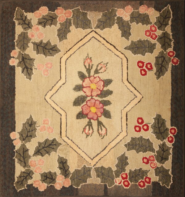 Low-pile hooked rug featuring a botanical pattern of pink and red flowers, green leaves, and a dark brown border.
