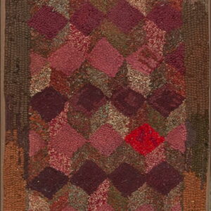 Highly textured runner rug with a dimensional geometric diamond pattern in burgundy, pink, and tan tones.
