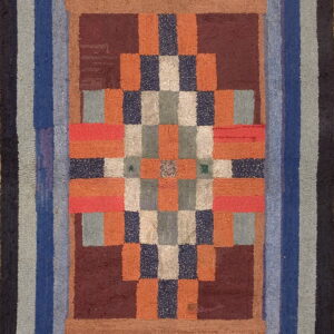 Multicolored high pile rug with a checkerboard center framed by stepped borders in varying hues of blue, grey, and coral.