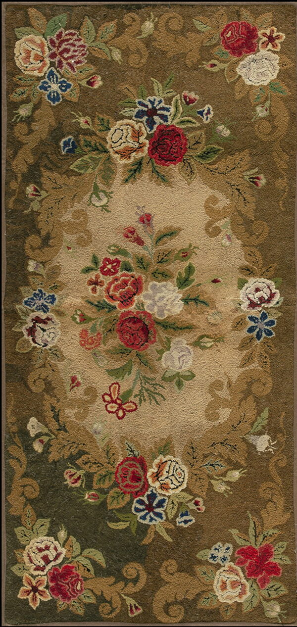 Runner rug displaying multicolored bouquets in a central beige oval framed by earthy brown and green scrollwork.