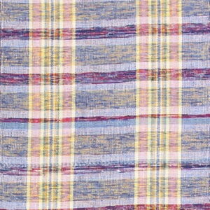 Textured plaid flatweave rug featuring horizontal and vertical stripes of blue, purple, yellow, and pink.