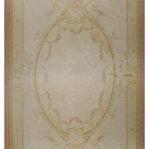 Cream rug featuring a large central oval medallion surrounded by pink floral garlands and gold scrollwork.
