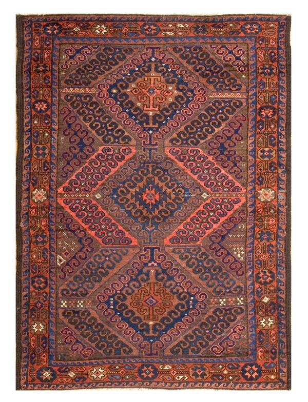 Geometric rug featuring stacked diamond medallions and scroll patterns in brown, blue, and red colors.