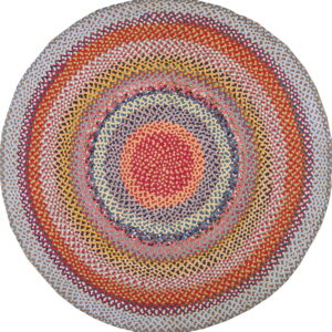 Round braided rug featuring concentric circles in red, yellow, orange, blue, and mixed colors.