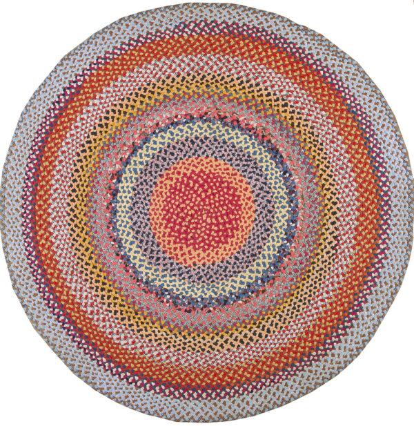 Round braided rug featuring concentric circles in red, yellow, orange, blue, and mixed colors.