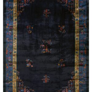 Deep navy rug with a sheen, bordered by detailed teal, gold, and multicolor floral and symbolic designs.