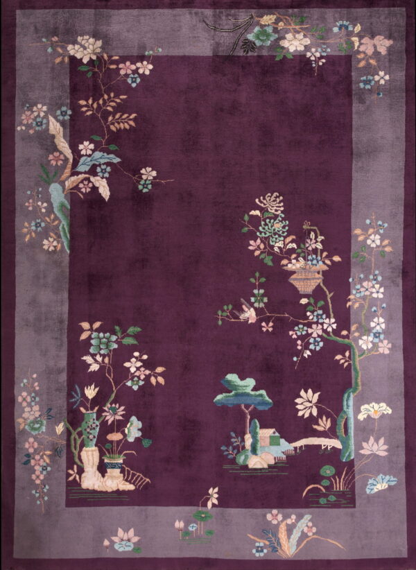 Deep plum rug with a plush pile and multicolored scenic design within a gray-lavender border.