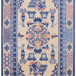 Cream field rug with ornate dark blue and peach borders surrounding architectural and stylized bird designs.