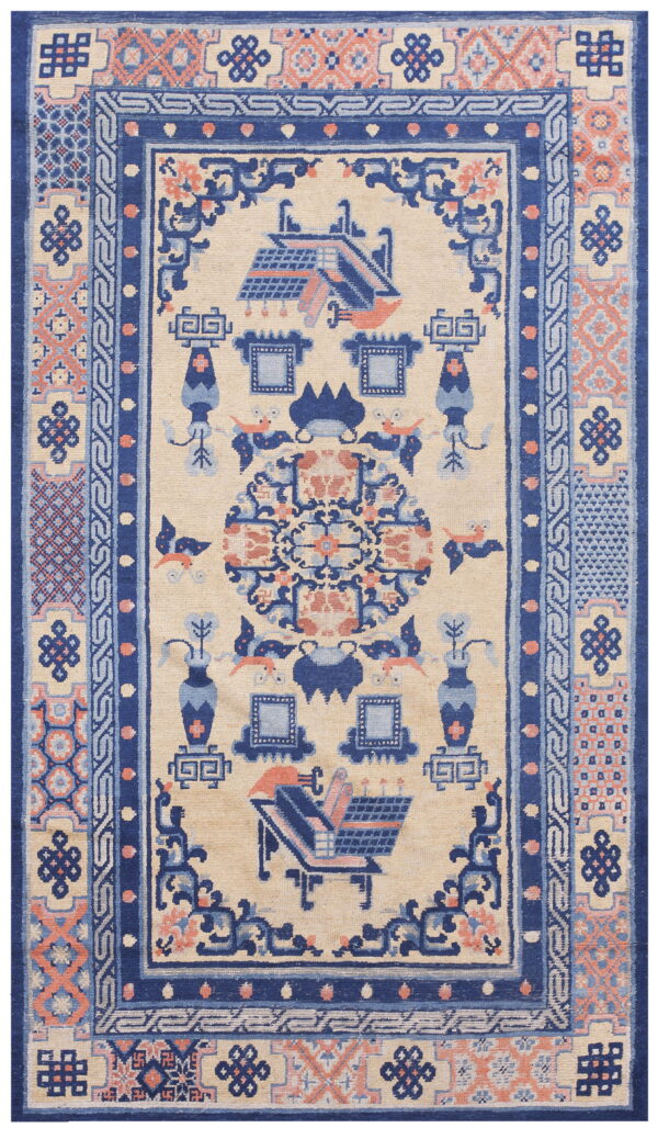 Cream field rug with ornate dark blue and peach borders surrounding architectural and stylized bird designs.