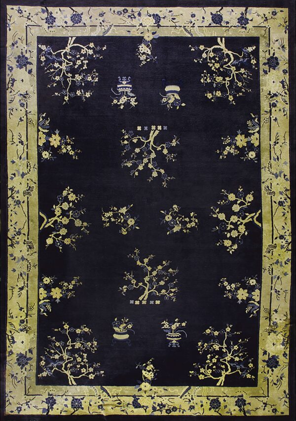 Dark navy high-pile rug featuring scattered gold and blue floral motifs within a wide olive border.
