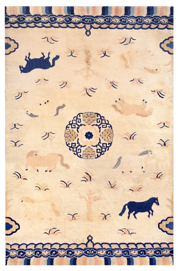 Beige field rug with blue and tan horse motifs, a geometric medallion, and striped borders.