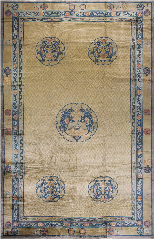 Lustrous gold rug featuring five blue dragon medallions over a subtle geometric lattice pattern.