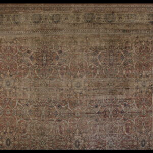 Muted red and beige ornate rug with intricate floral designs and multiple layered borders.