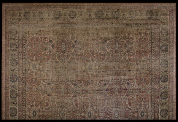 Muted red and beige ornate rug with intricate floral designs and multiple layered borders.