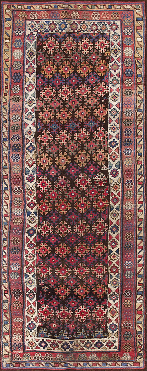 Runner rug with a dark brown field, red and blue geometric tribal motifs, and wide multi-toned rose borders.