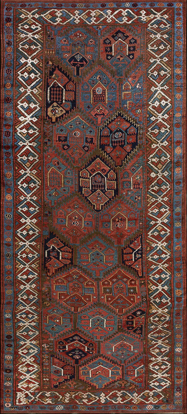 Geometric tribal runner rug featuring repeating stylized terracotta and blue motifs within wide diamond borders.