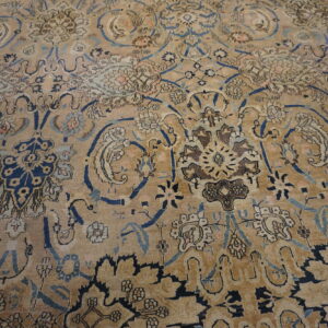 Intricate floral patterns on vintage rug