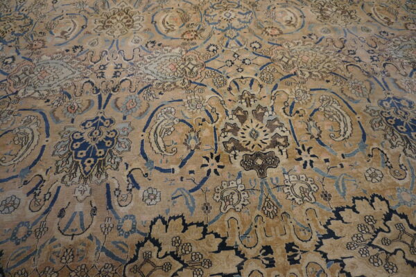 Intricate floral patterns on vintage rug