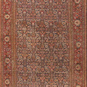 Narrow runner rug with a dense navy field pattern and a wide, intricate red and rust primary border.