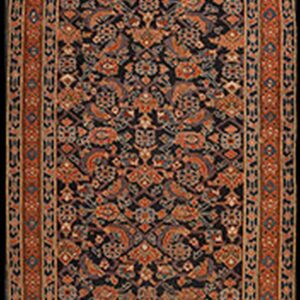 Long runner rug with dense navy and rust floral patterns, bordered by thick, multi-layered bands.