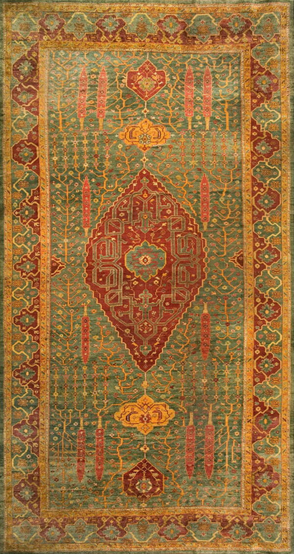 Ornate rug featuring a teal-green field, a large rust medallion, and elaborate gold vine motifs.