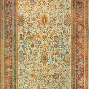 Low-pile rug with a cream field, orange and yellow faded floral patterns, and a thick red border.