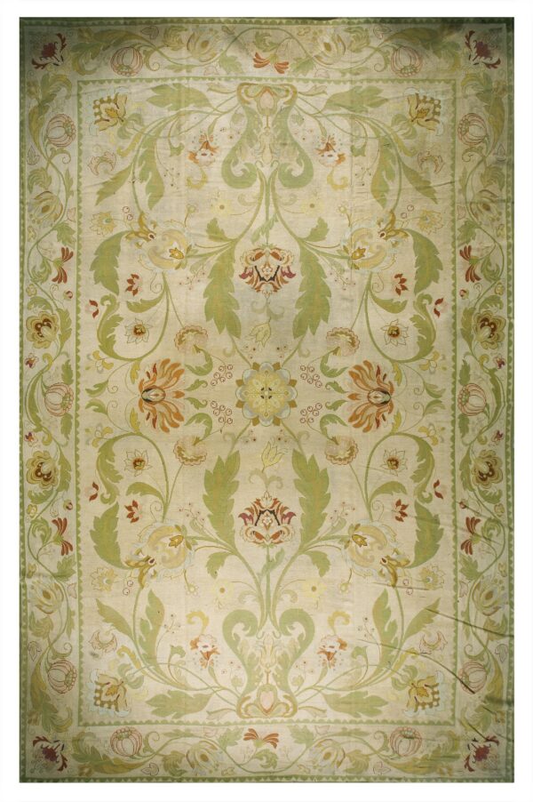 Elaborate botanical rug featuring symmetrical scrolling vines and flowers in cream, sage green, and rust tones.