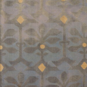 Low-pile blue rug featuring a repeating gray botanical design accented with pale gold diamonds.