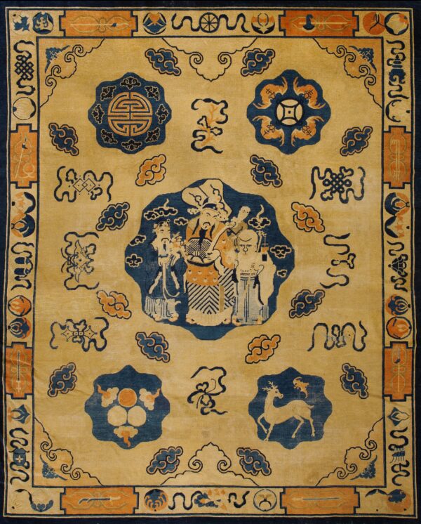 Pictorial rug in golden yellow, navy blue, and coral featuring figures, deer, and clouds on wood flooring.