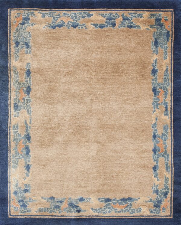 Beige rug featuring a detailed blue, light blue, and orange patterned border and a solid navy edge.