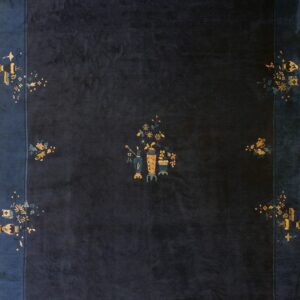 Navy rug with floral motifs.