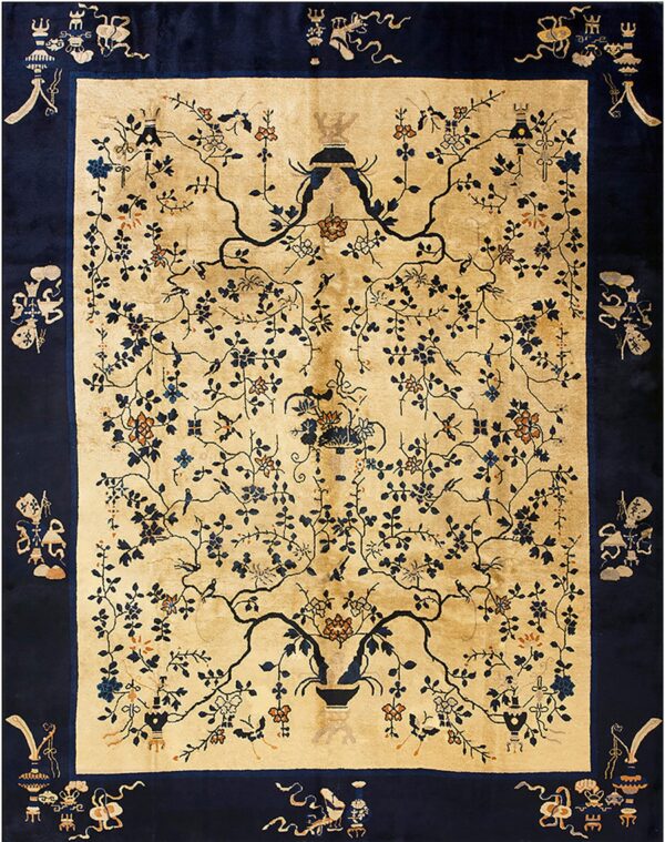 Navy and gold rug with a detailed central floral vine design and symbolic corner motifs in the border.