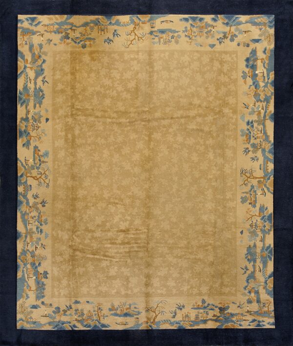 Beige rug with subtle floral design, wide landscape border in blue and tan, framed by a solid dark blue edge.