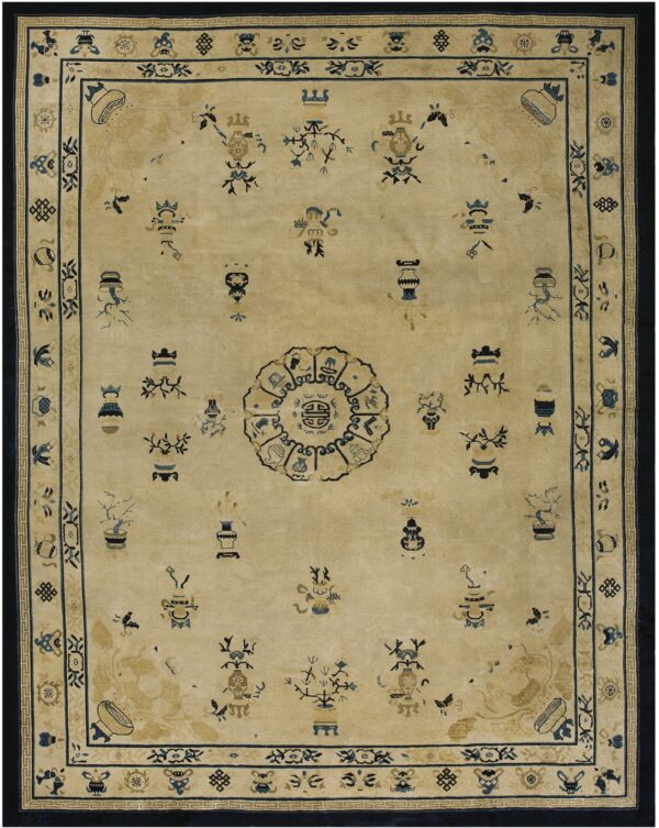 Beige traditional rug featuring scattered blue and gold auspicious symbols, a central medallion, and a dark blue border.