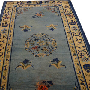 Blue floral medallion antique rug