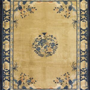 Gold field rug with blue borders featuring central and corner stylized floral and bird designs.
