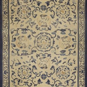 Ivory rug with sprawling blue motifs, central medallions featuring birds, and a thick dark blue border.