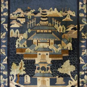 Deep blue pictorial rug depicting a large pagoda surrounded by beige and green landscape elements.