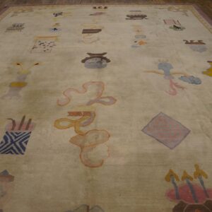 Large pale rug with a whimsical, scattered pattern in pastel colors on dark wood flooring.