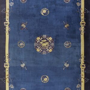 Deep blue rug with a large central animal medallion and light yellow borders featuring trailing florals.