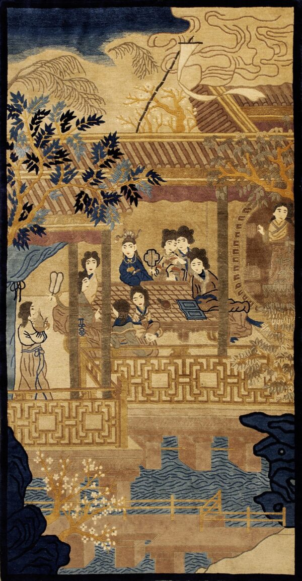 Highly detailed vertical rug in tan, brown, and navy, showing figures gathered around pavilion architecture.
