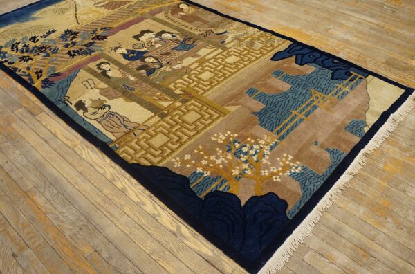 Detailed pictorial rug in beige, navy, and gold, depicting figures and architecture on worn hardwood flooring.