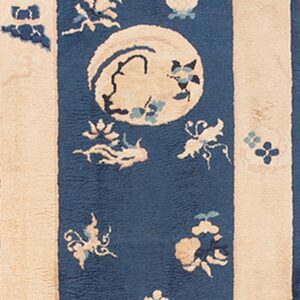 Deep blue runner rug featuring cream circular medallions and stylized floral patterns in the central field.