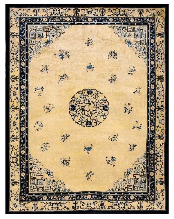 Traditional pale yellow rug with dark blue borders and scattered floral sprays around a central medallion.