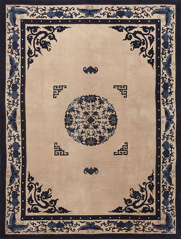 Ornate light beige rug with a navy blue central medallion and multiple detailed decorative borders.