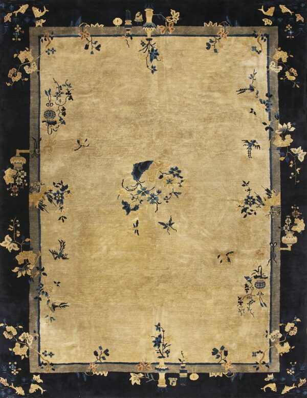 Gold field rug bordered by dark navy, featuring scattered stylized blue and tan floral and insect motifs.
