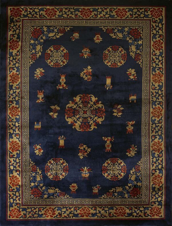 Navy blue rug featuring detailed gold and red floral medallions and an elaborate multi-layered border.